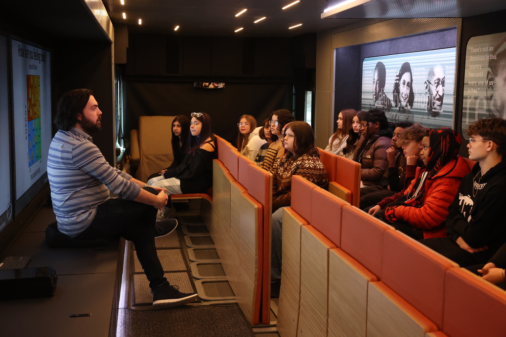 Visitor talks to students about tolerance 