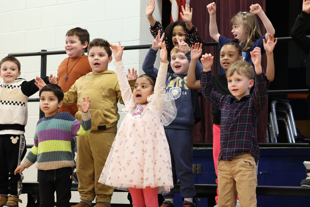 students dance and sing 