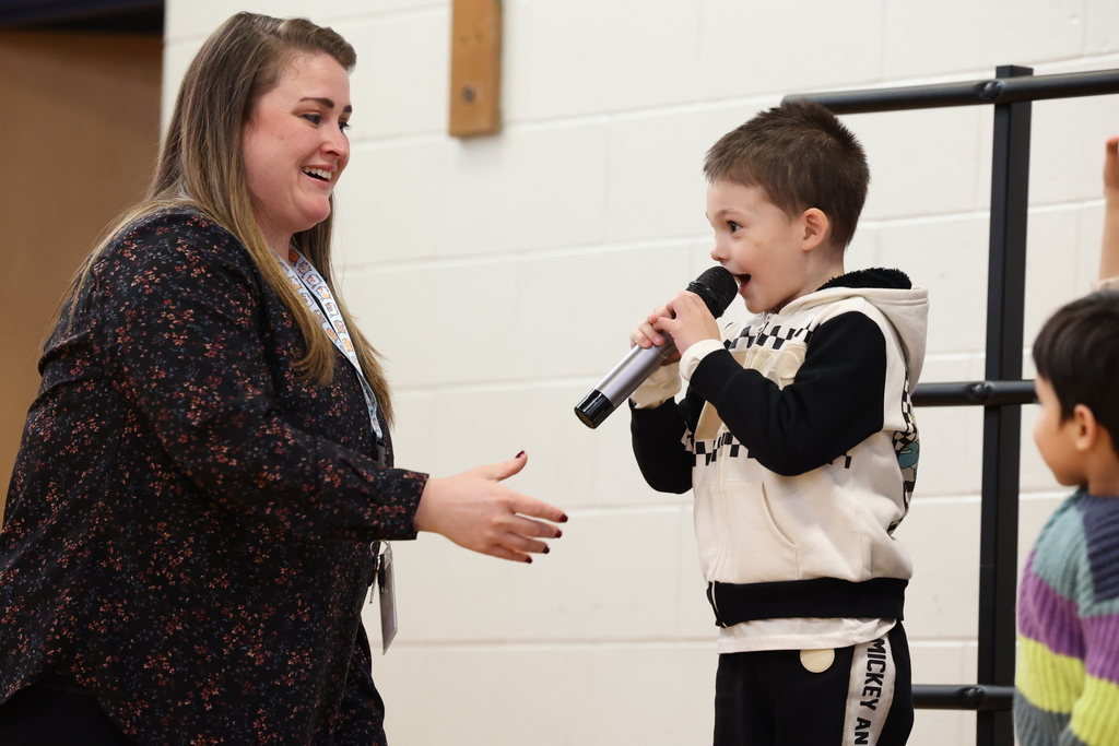 student talks into the mic