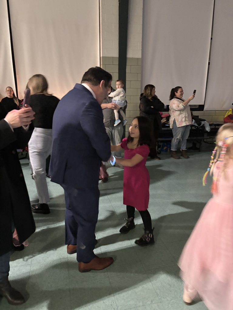 Student dances with parent at dance