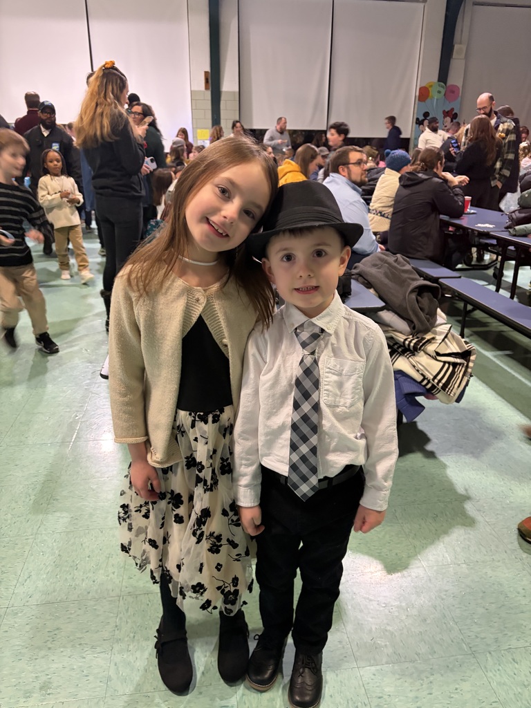 students smile for a photo dressed up