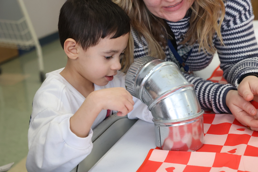 student looks at construction equipment