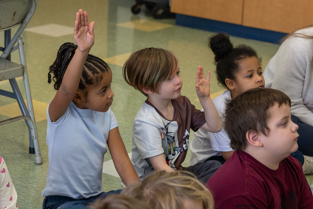 Mrs. Grow talking with kindergarten classes