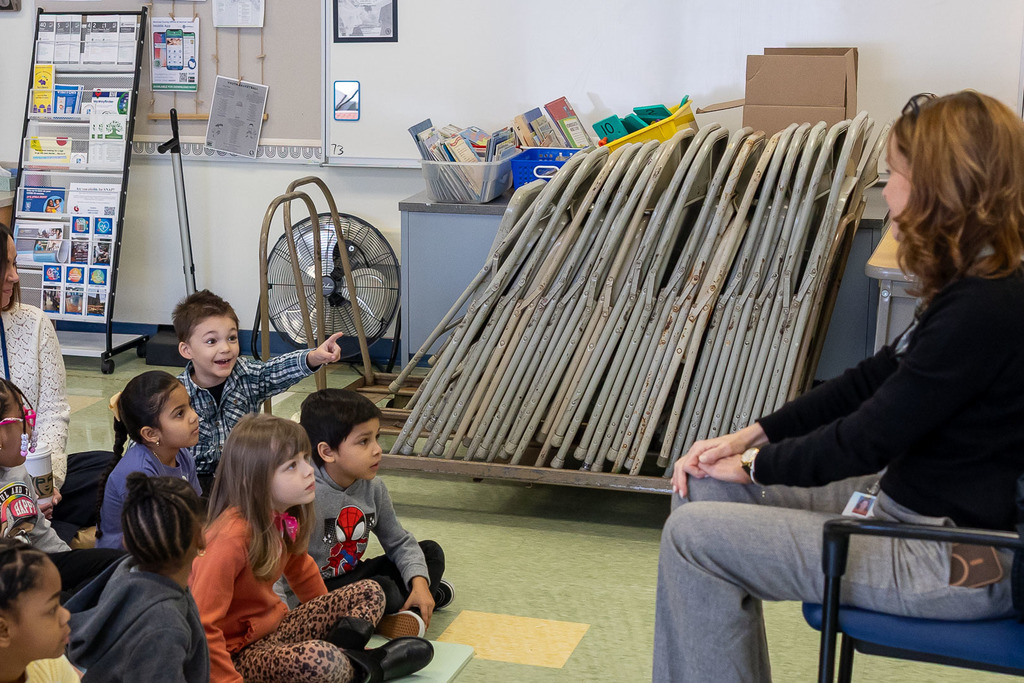 Mrs. Grow talking with kindergarten classes