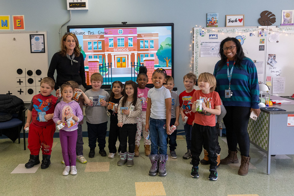 Mrs. Grow standing with Mrs. Sloan's class