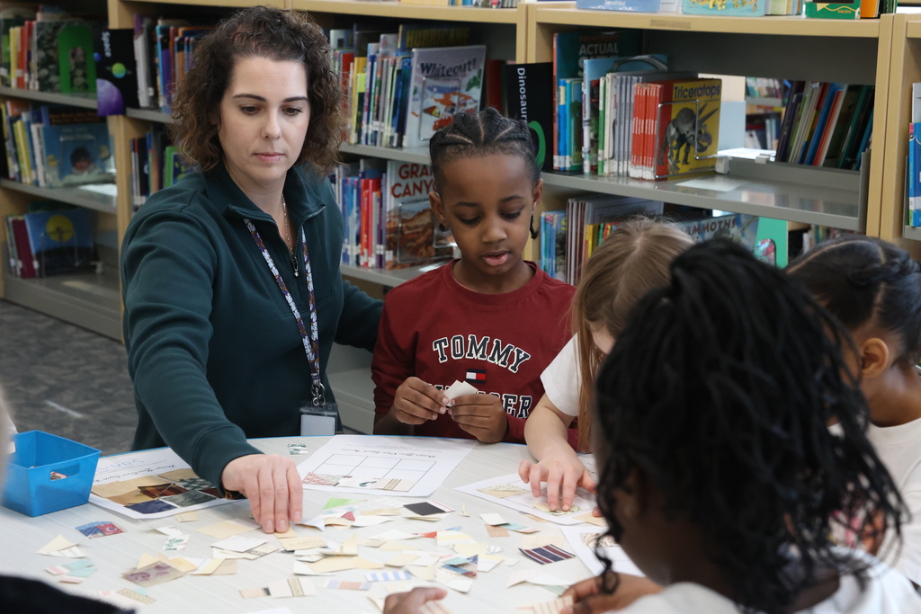 student and staff work on quilt activity