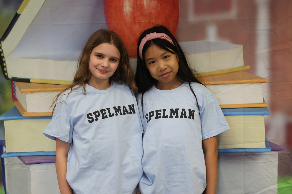students pose in spelman shirts