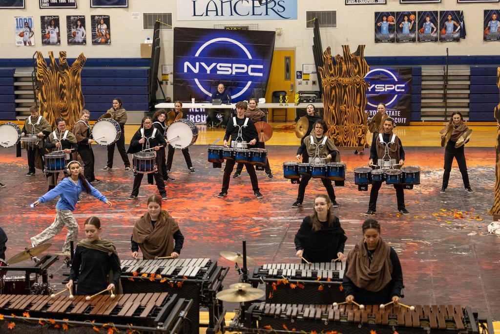 students play instruments during performance