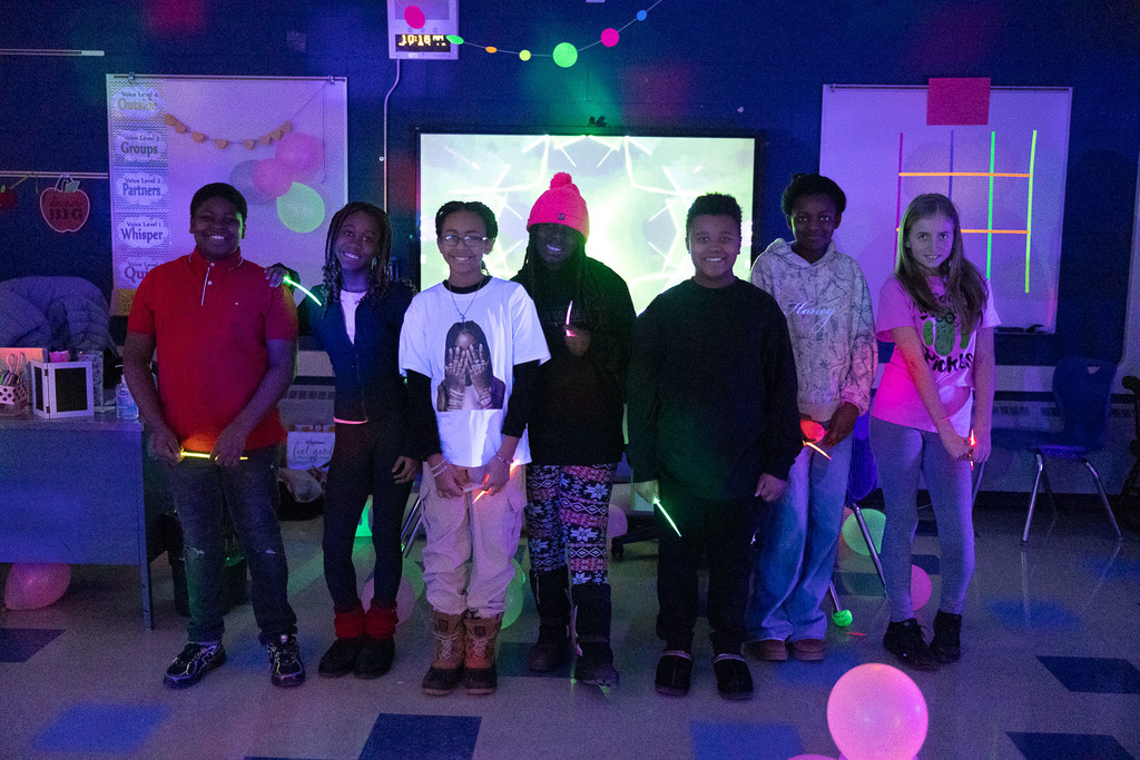 5th graders playing games in the dark at their glow party