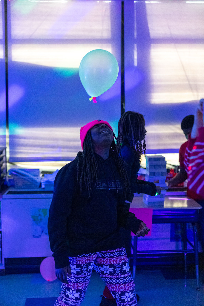 5th graders playing games in the dark at their glow party