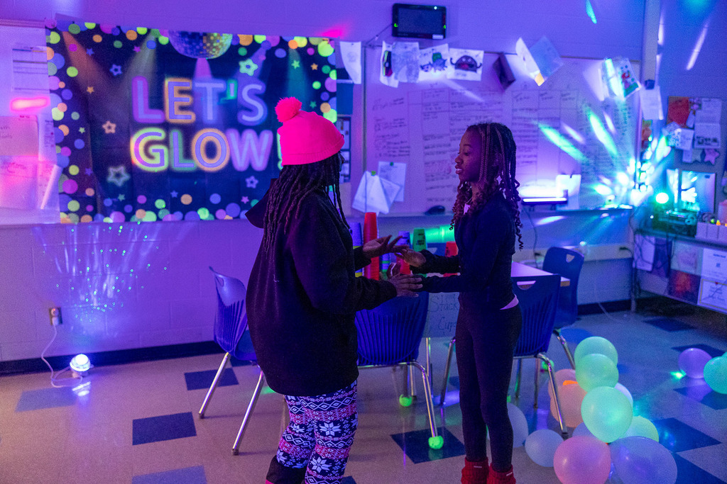 5th graders playing games in the dark at their glow party