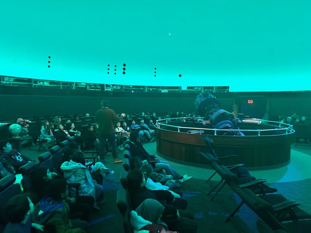 students at the planetarium 