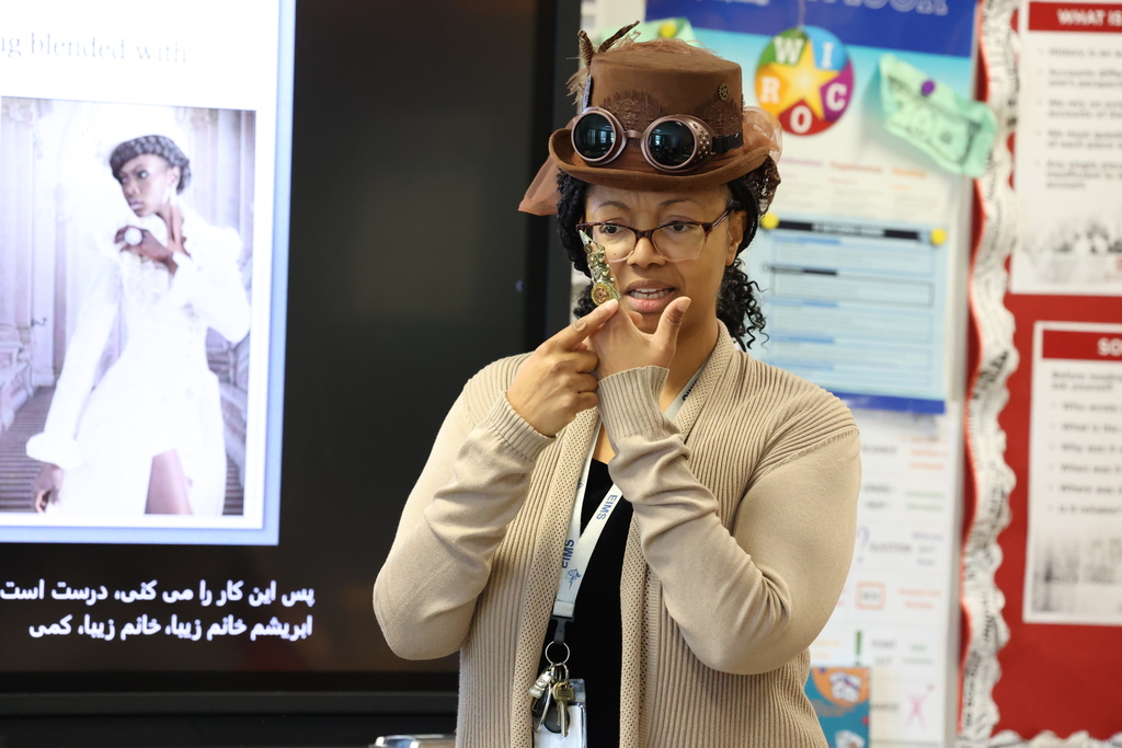 teacher shows ring to students