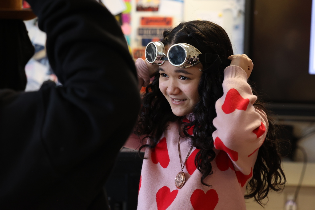 student puts on googles