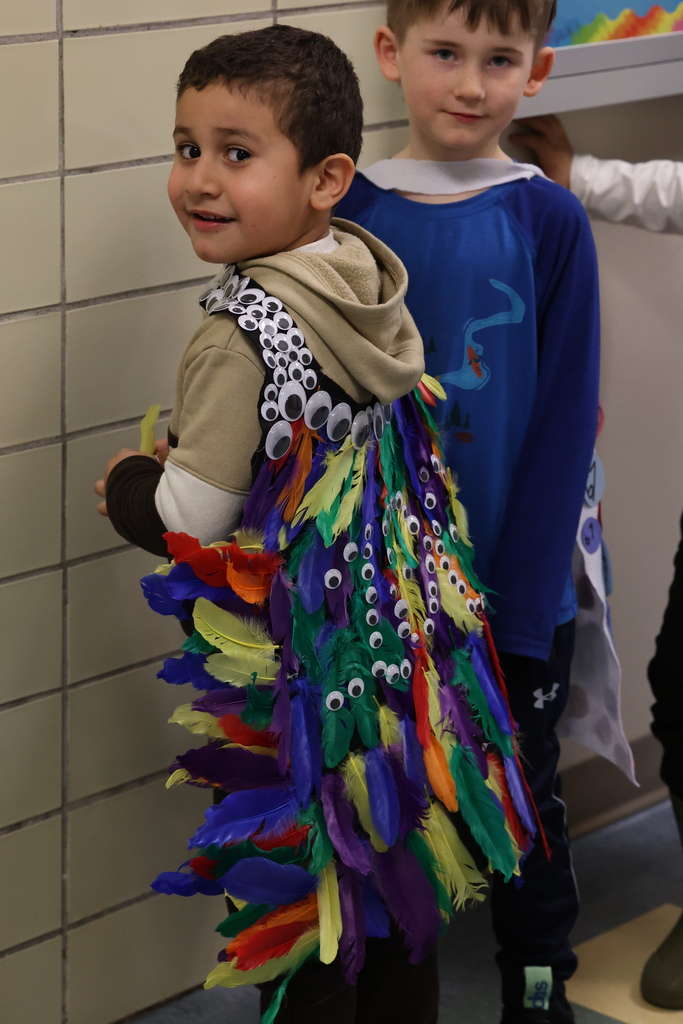 student shows off cape