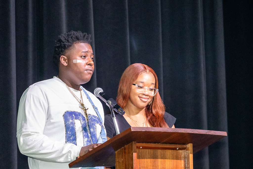 Students giving presentations and performances during the black history month celebration