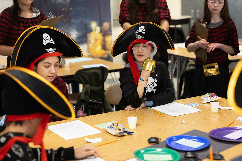 Students dressed as pirated and participating in the classroom lesson