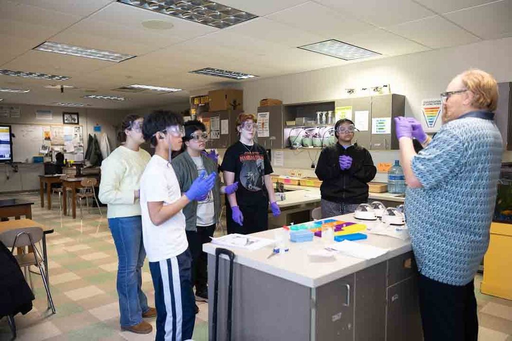 Biotech club conducting an experiment