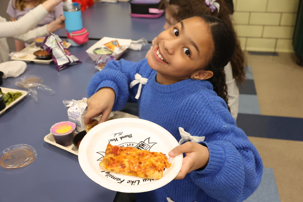 students smiles with cheese pizza and plate