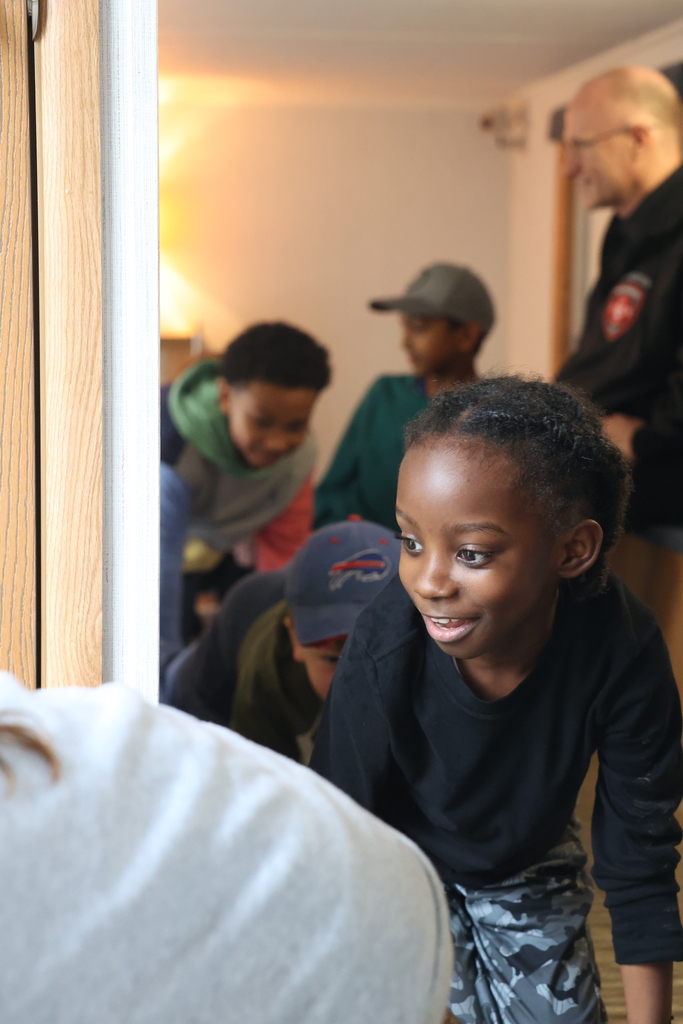 students practice crawling when there is smoke