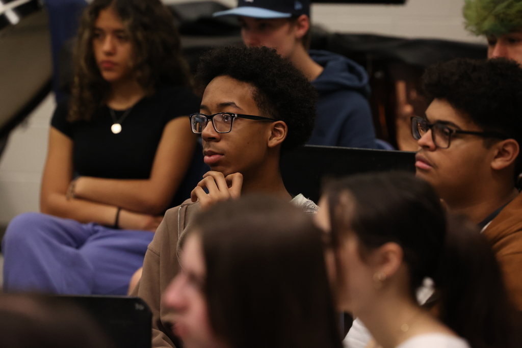 Student listens to speaker