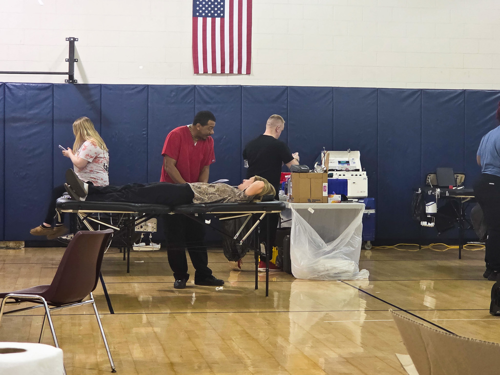 students and members of the American Red Cross in the gymnasium during the blood drive at eastridge
