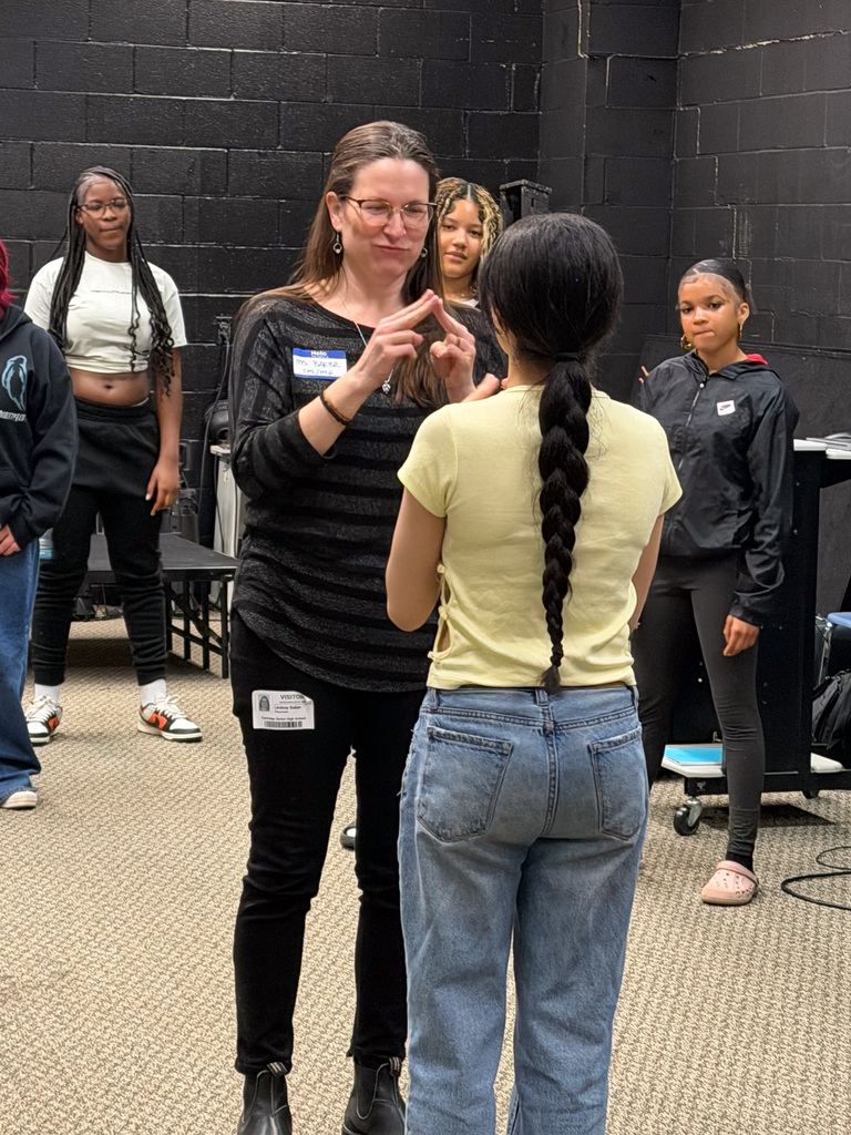 students rehearses with U of R student