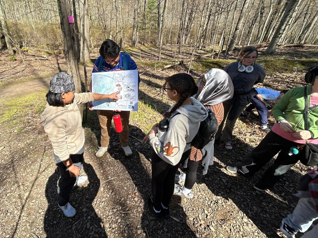 students point at map and travel the trail at Mendon Ponds Park