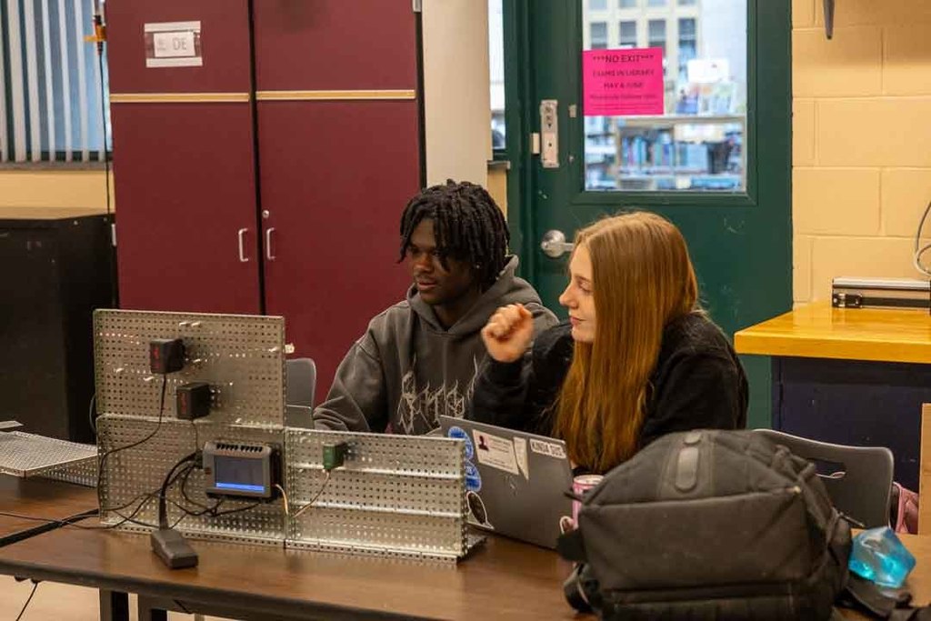 Students working on their marble sorters