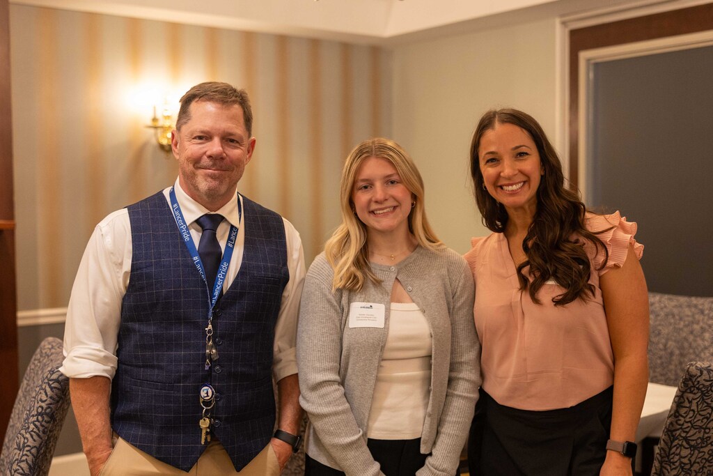 Natalie with principal and teacher