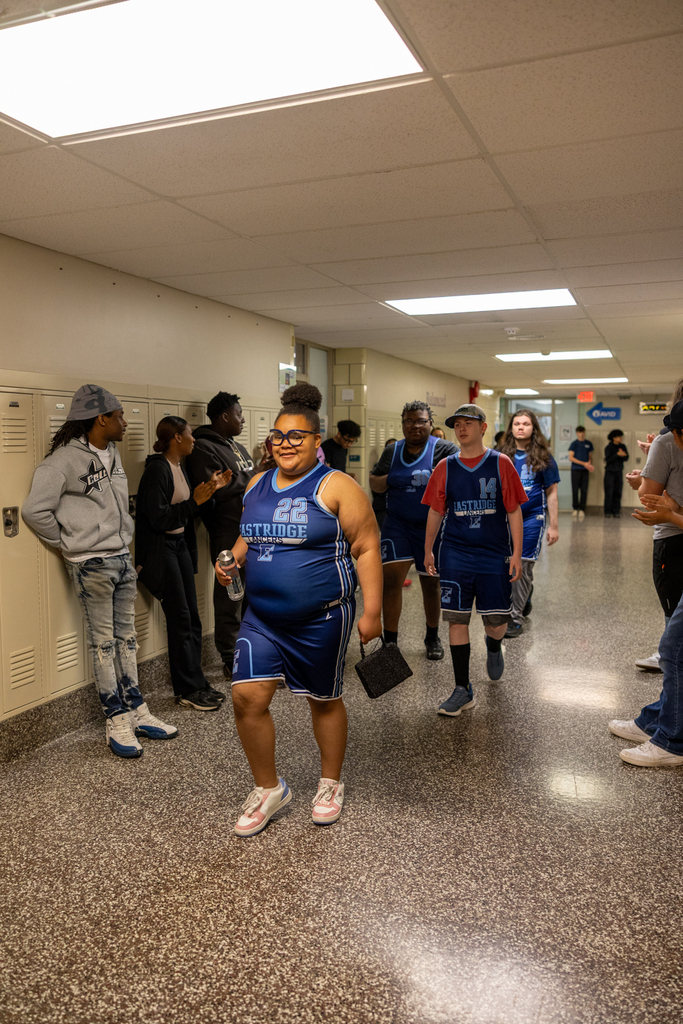 Unified Basketball Players walking through the halls