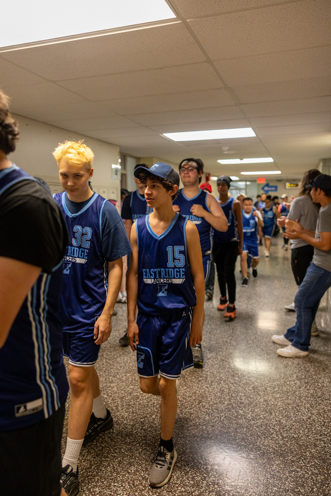 Unified Basketball Players walking through the halls
