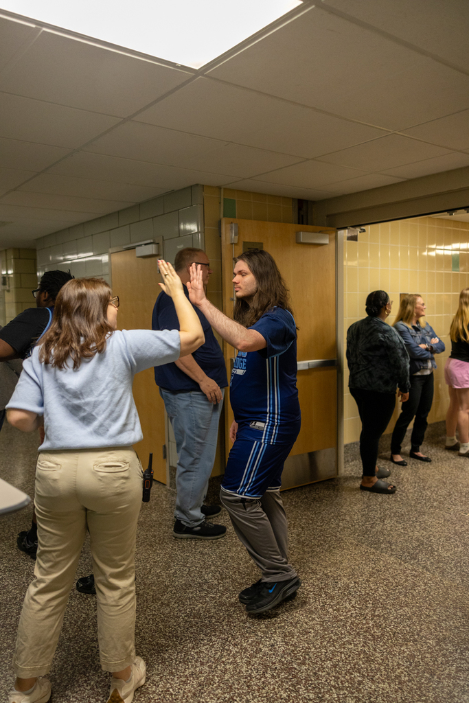 Unified Basketball Players walking through the halls
