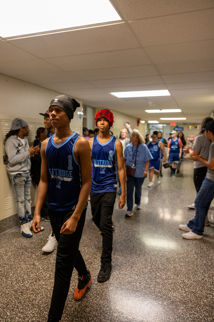 Unified Basketball Players walking through the halls