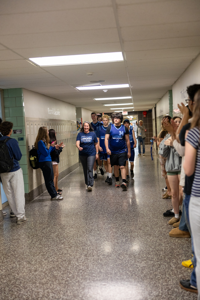 Unified Basketball Players walking through the halls