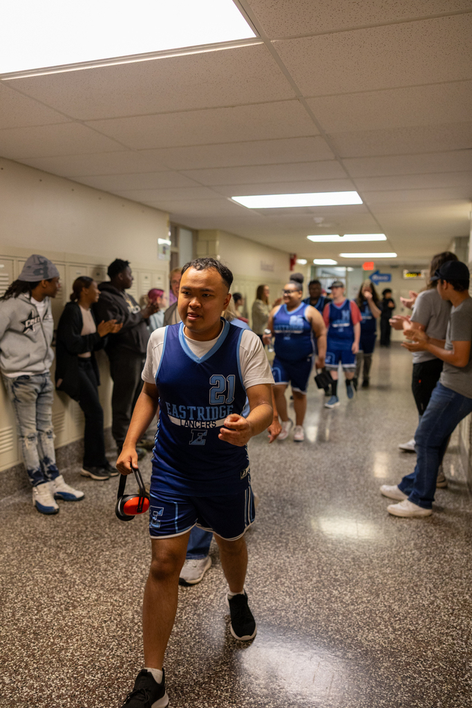Unified Basketball Players walking through the halls