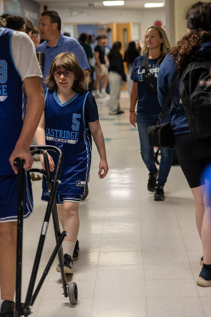 Unified Basketball Players walking through the halls