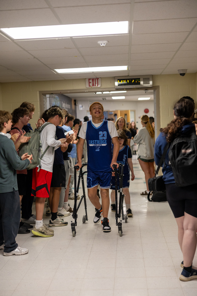 Unified Basketball Players walking through the halls
