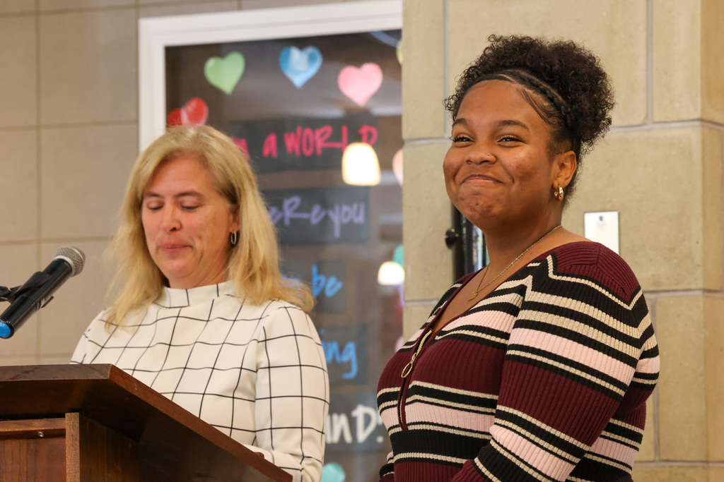Student laughs as staff member says speech about her