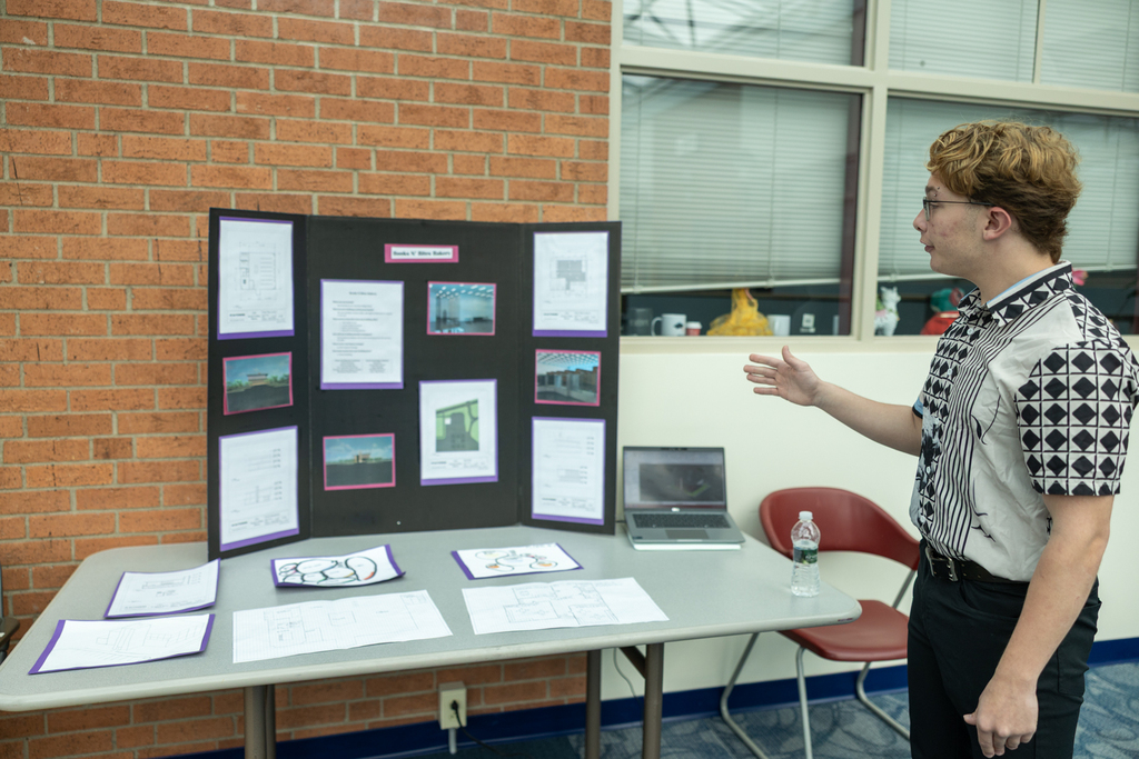 Students presenting their PLTW projects