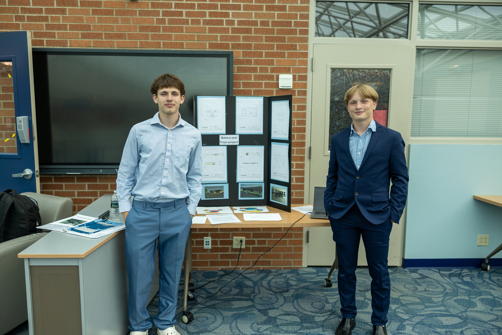 Students presenting their PLTW projects