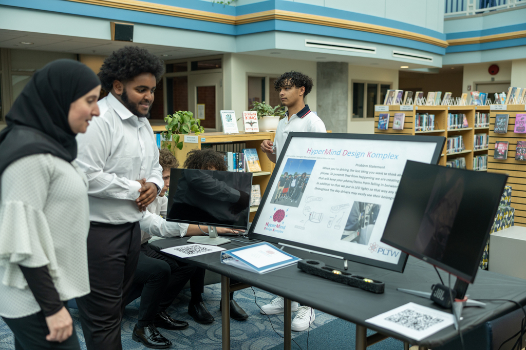 Students presenting their PLTW projects