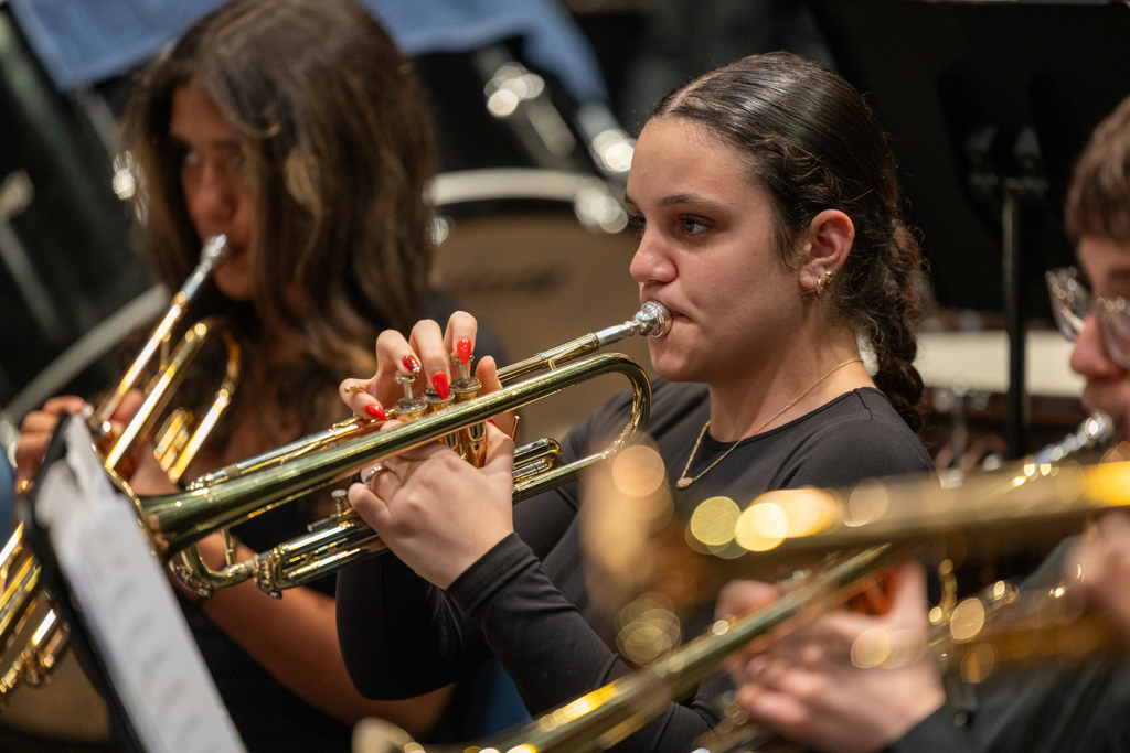 student playing the trumpet