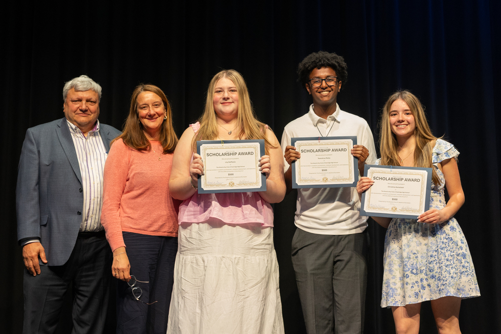 Scholarship winners posing with their certificate