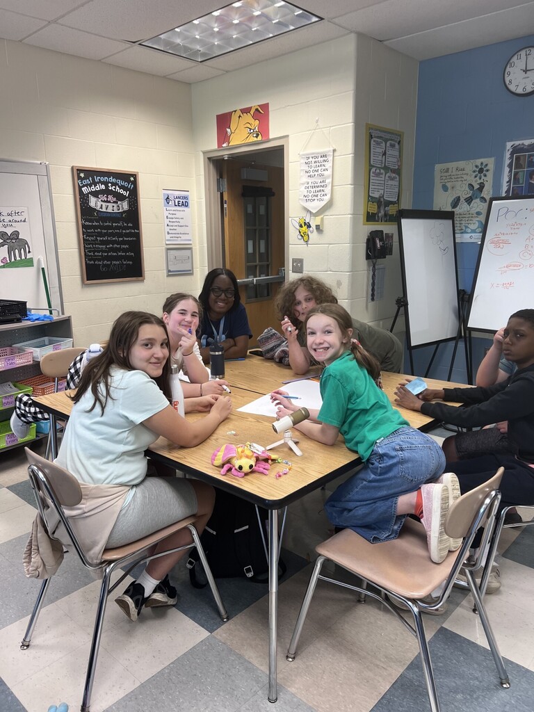 student committee working together to come up with ideas