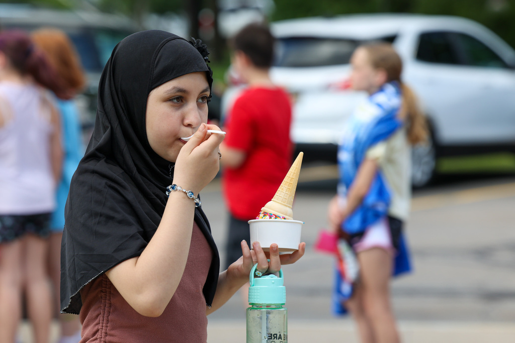 student eats icecream