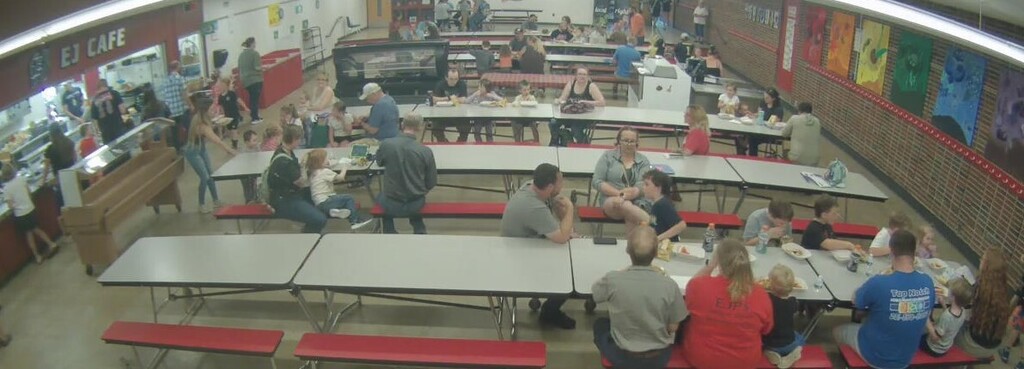 Elementary Families enjoying the Hot Dog Dinner hosted by the East Jordan School Board at the Elementary Open House