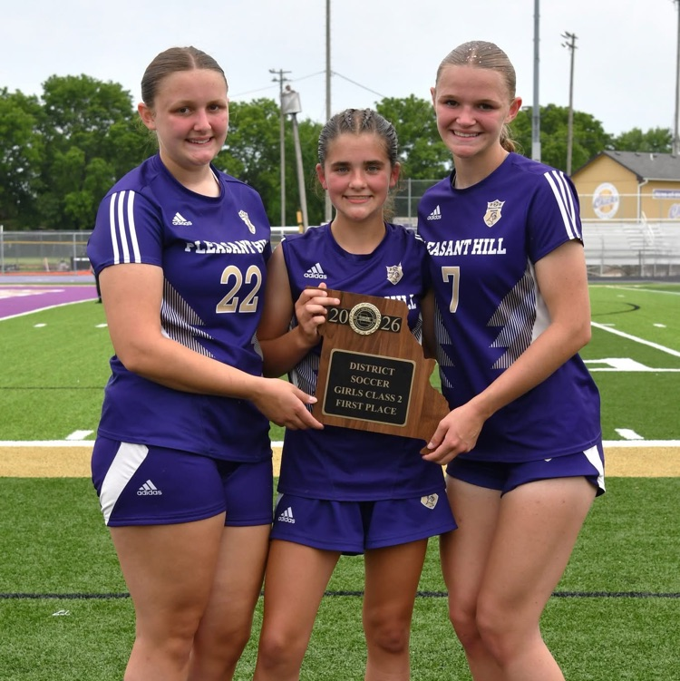 three soccer players 