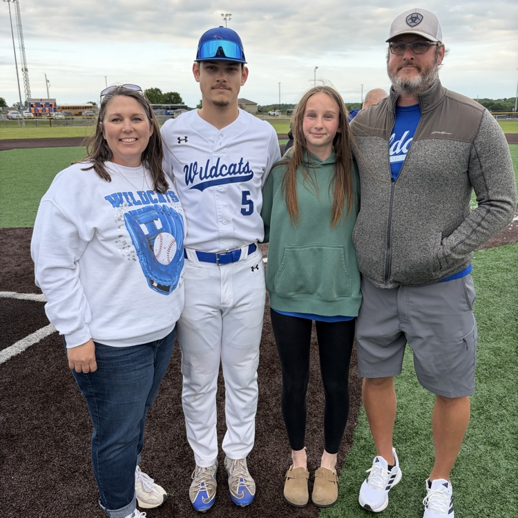 family on a baseball field