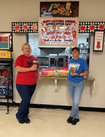 Ashely and Jennifer posing for a photo for Cafeteria Worker Appreciation Day.